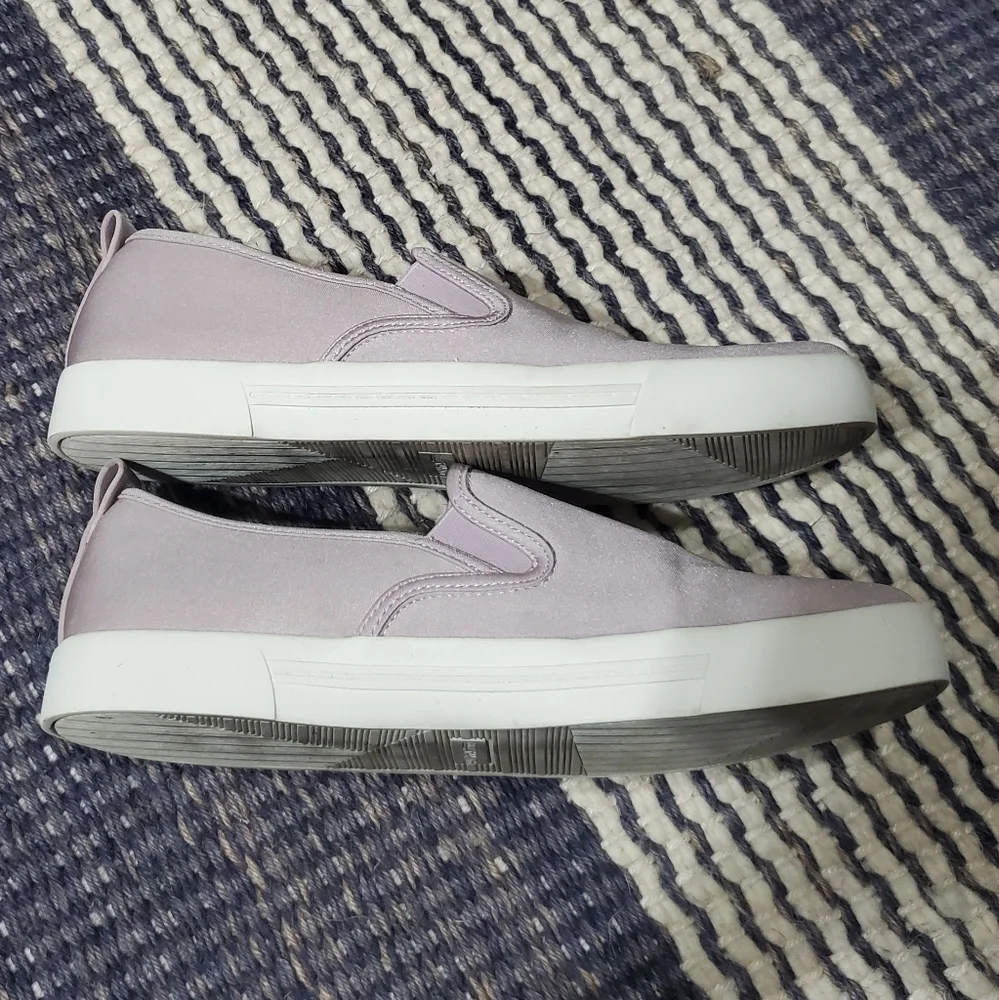 Call it spring purple flat slip on Sneakers shoes.